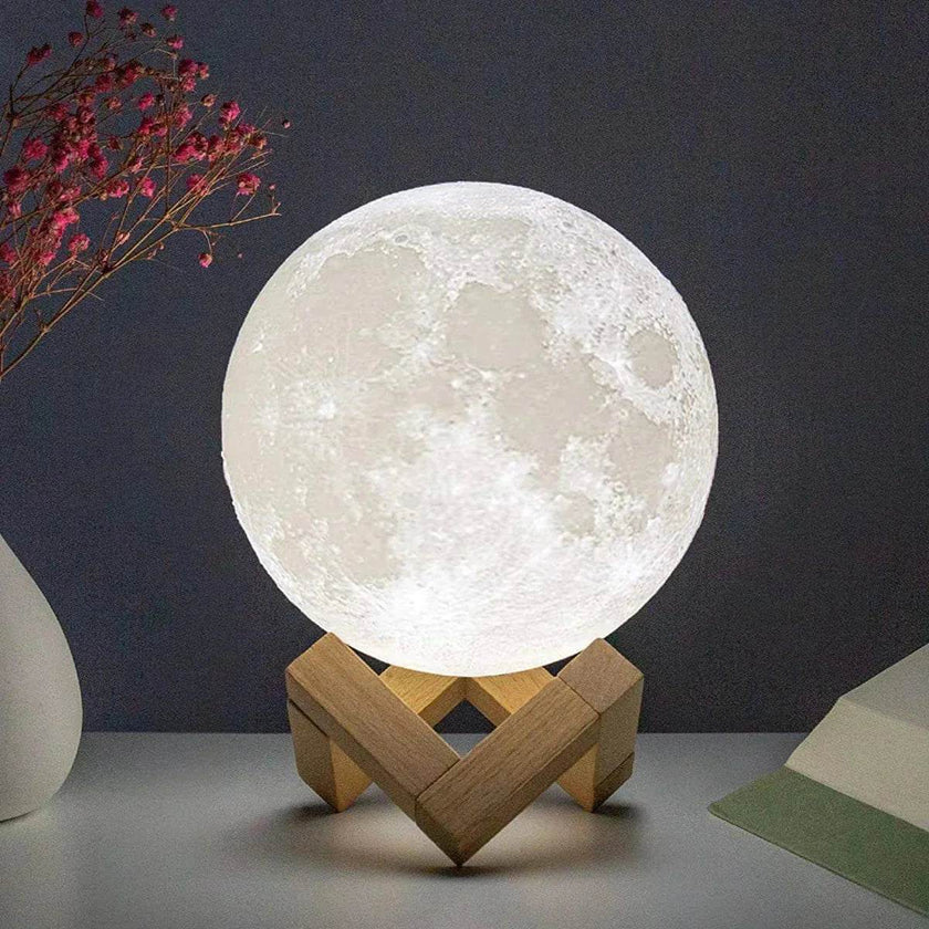 D5 Starry Moon Lamp with realistic white moon texture on a wooden geometric stand emitting soft night light