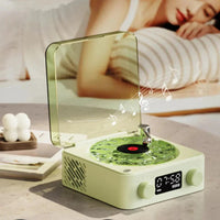 Mini Retro White Noise Bluetooth Speaker in pale yellow with clear lid, vintage record player design, digital display, and dual knobs