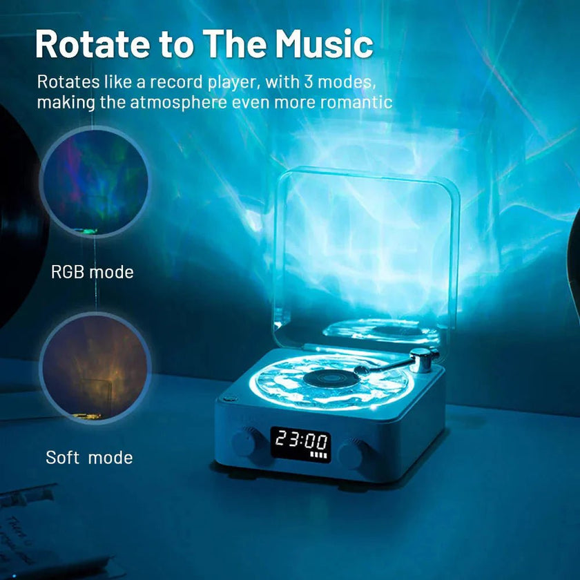 Mini Retro White Noise Bluetooth Speaker in white with RGB lighting and a rotating record player design, showing digital clock display
