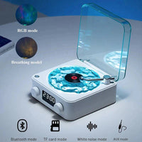 Mini Retro White Noise Bluetooth Speaker in white with a transparent lid, blue water ripple design, LCD display, and control knobs